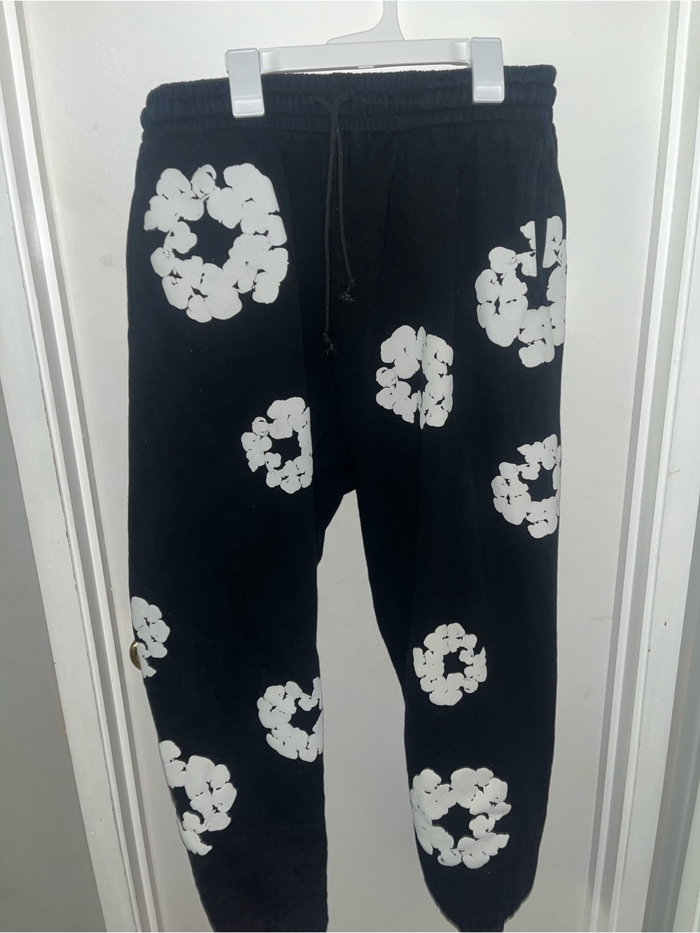 Black Sweatpants with White Floral Ring Prints